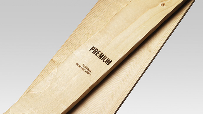 Videojet laser code carbonized into wood – high-contrast mark example.