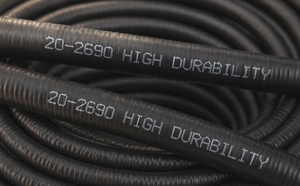 high-contrast white code on dark cable