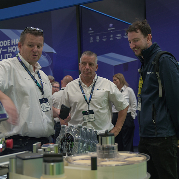 Videojet representatives talking to customer