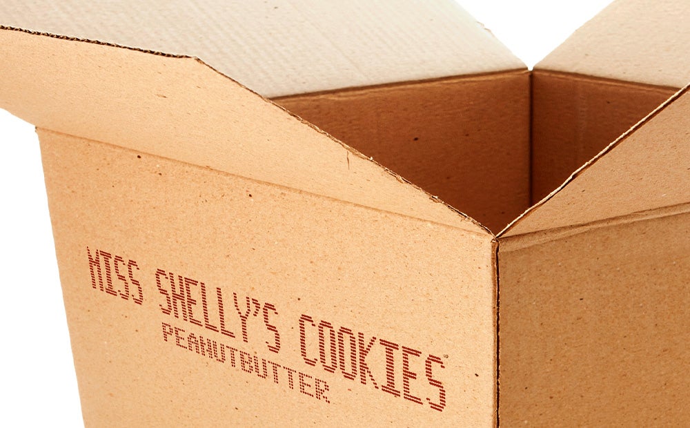 Large character marking printed on corrugated carton box for baked goods packaging.