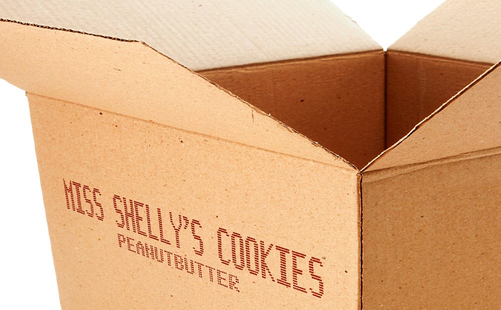 Large character marking printed on corrugated carton box for baked goods packaging.